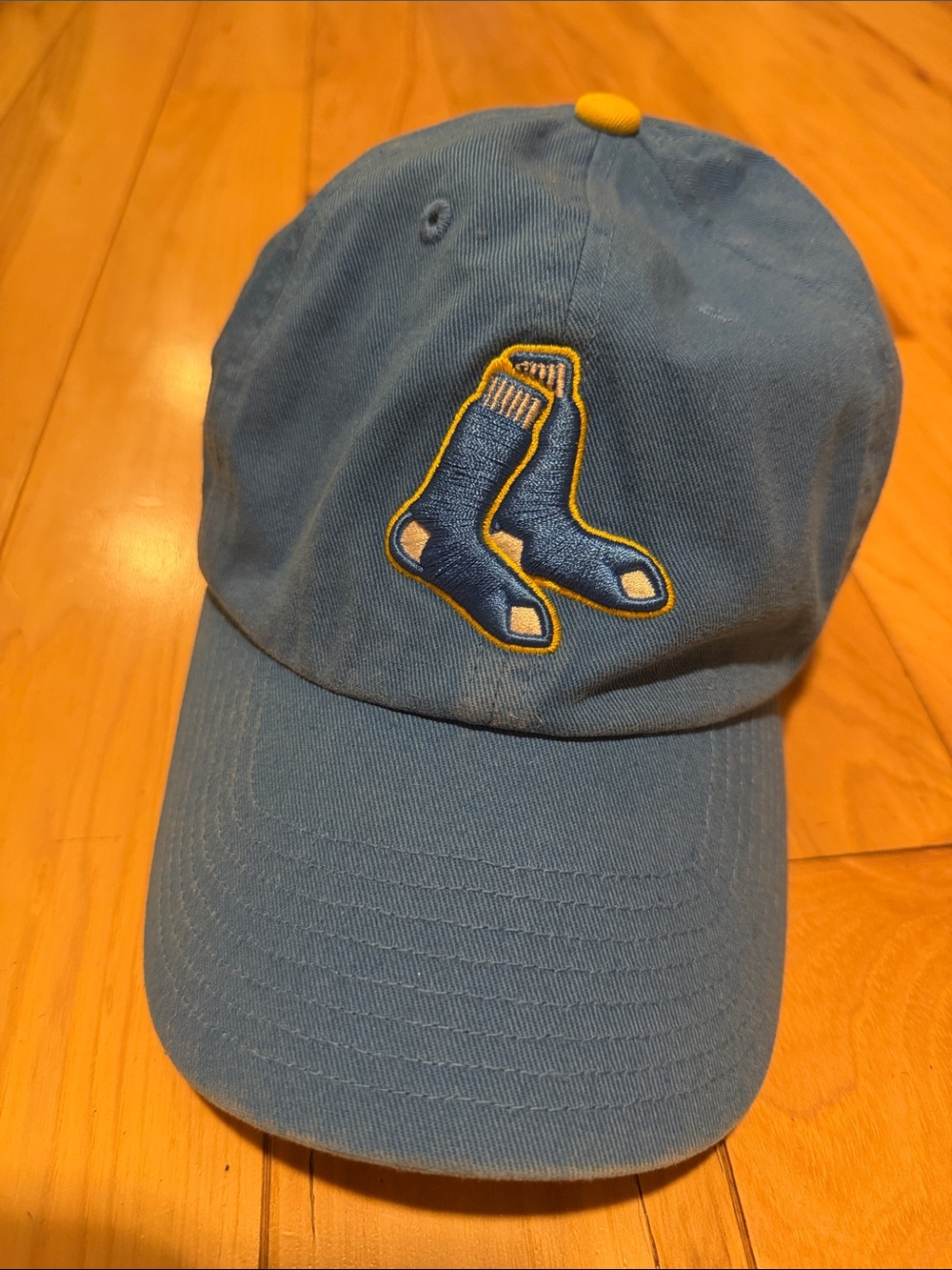 Blue Baseball Cap with Embroidered Socks Patch